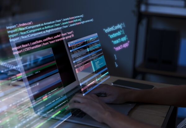 programming-background-with-person-working-with-codes-computer.jpg
